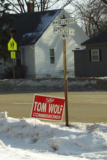 Campaign Sign: Vote Tom Wolf, Commissioner, 2nd and Chicago, Madison, SD