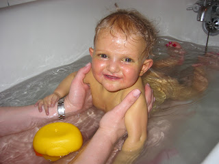 Sasha in the bath with Mom, Saturday, April 23, 2005, 3:33 PM