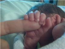 Christopher with Tatianas Finger