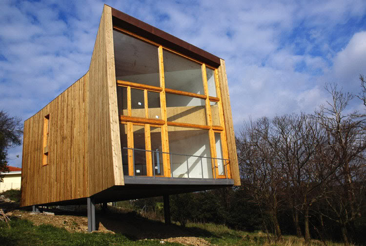 de la calle a la Arquitectura.....: Vivienda de acero y madera. Ranón
