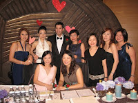 An image of the wedding couple with their friends