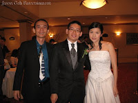 Band manager Jason Geh with wedding couple Adrian and Shao Yi at the foyer