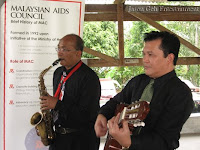 Two piece strolling musicians performing