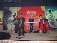 chinese singer accompanied by Jason Geh's live jazz band