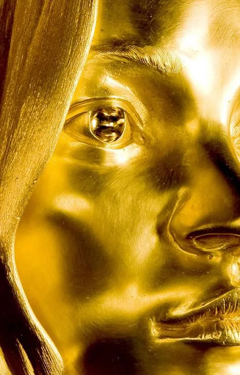 golden glimpse of Marc Quinn's sculpture of Kate Moss