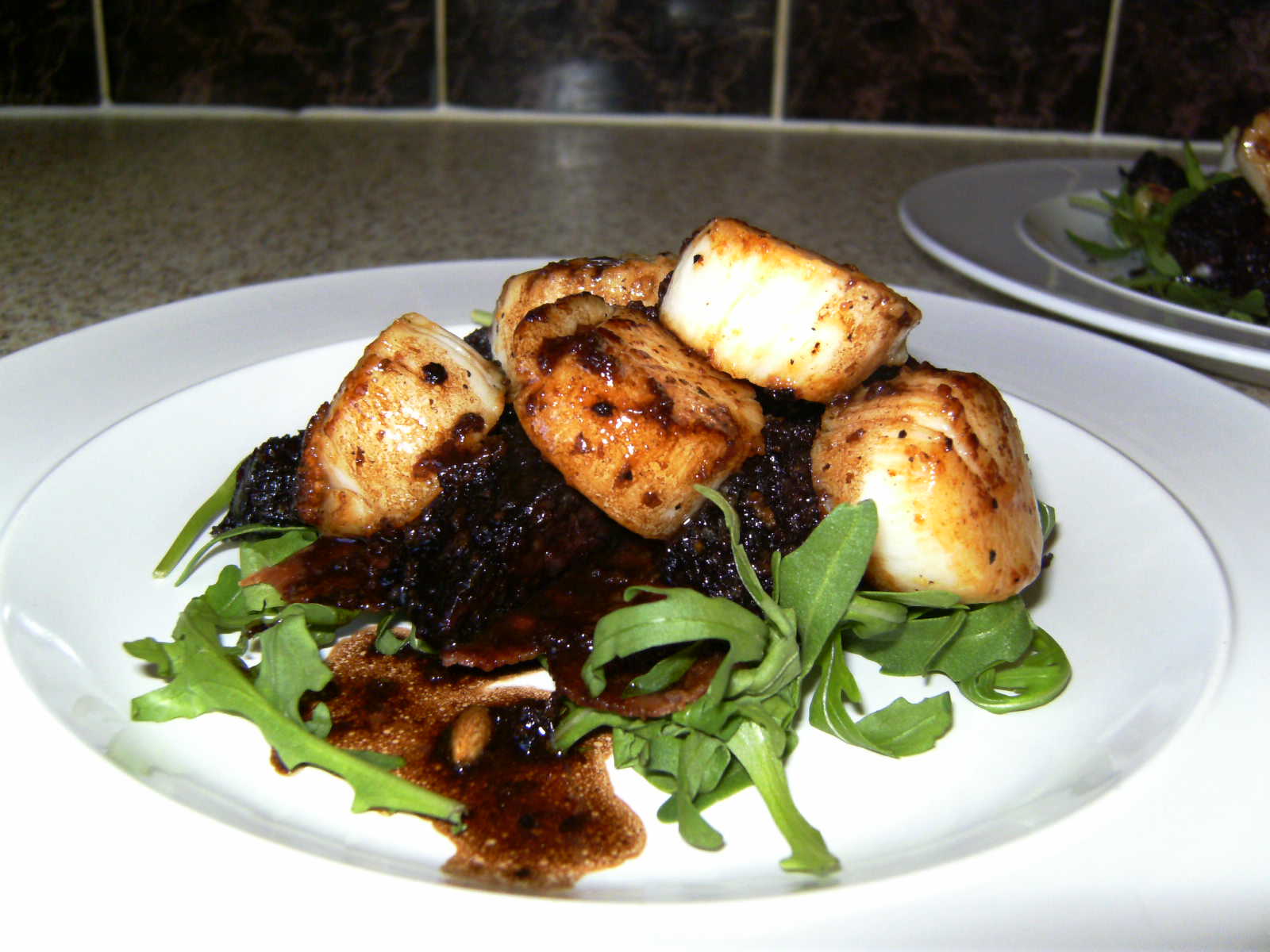 White Wine in the City Scallops with black pudding, crispy bacon and