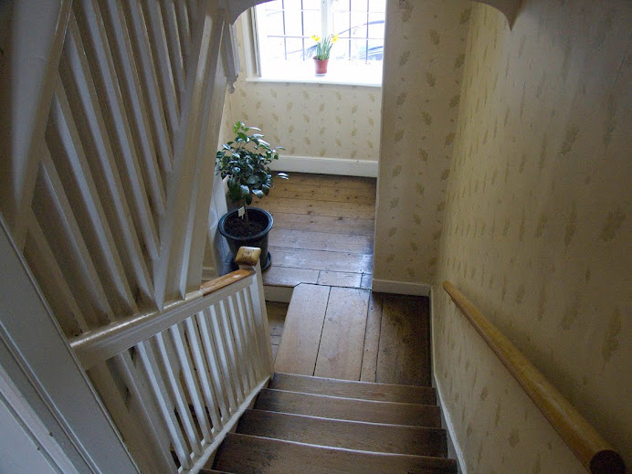 Looking down the stairs from outside Jane's bedroom at Chawton.