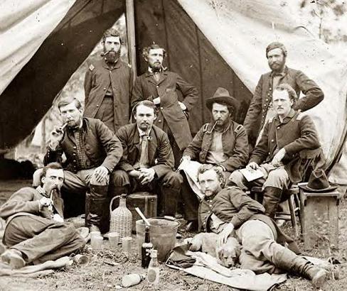 Custer with friends, Peninsula, Va., 1862. Custer has another dog in this photo