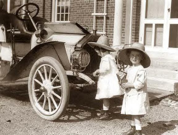 Twin girls with 1911 Buick Speedster