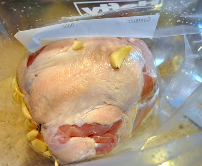 Crock pot turkey breast covered in garlic