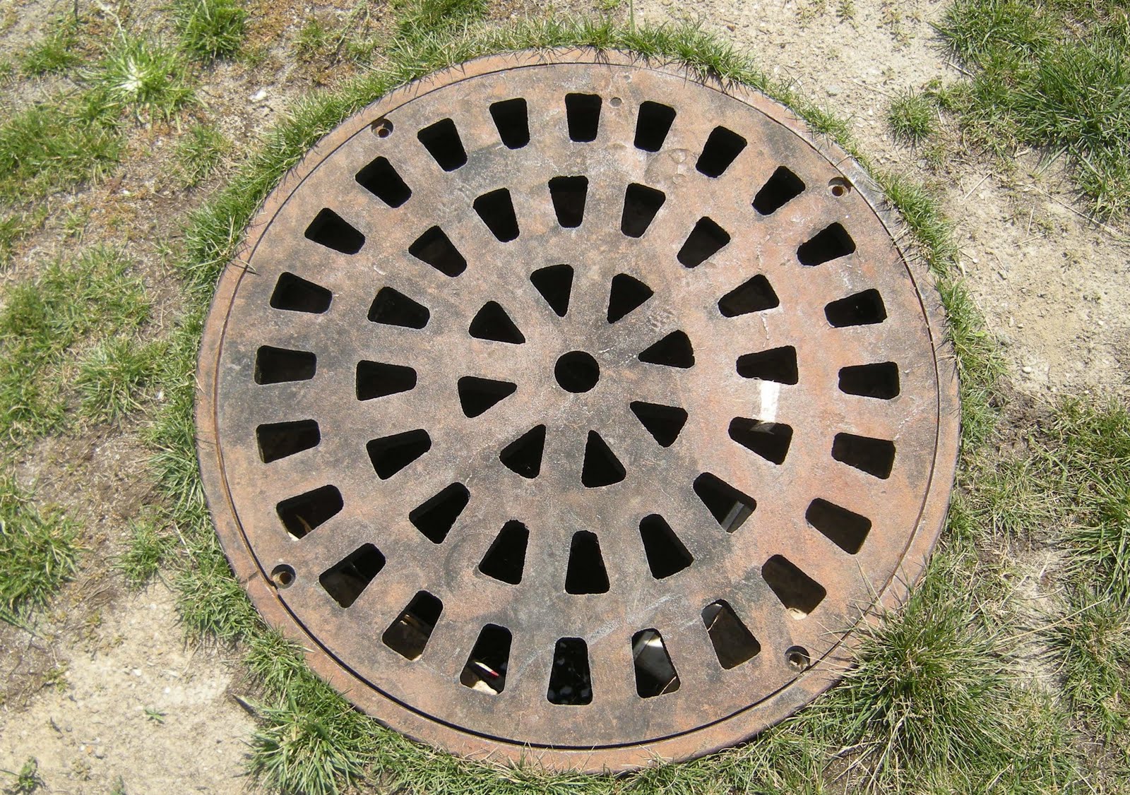 The Mathematical Tourist: Manhole Cover Geometry