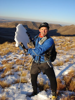 Trevor Ball with a chunk of frozen snow