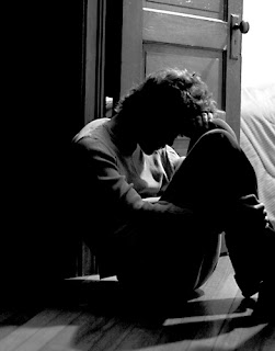 depressed-man-in-door.jpg