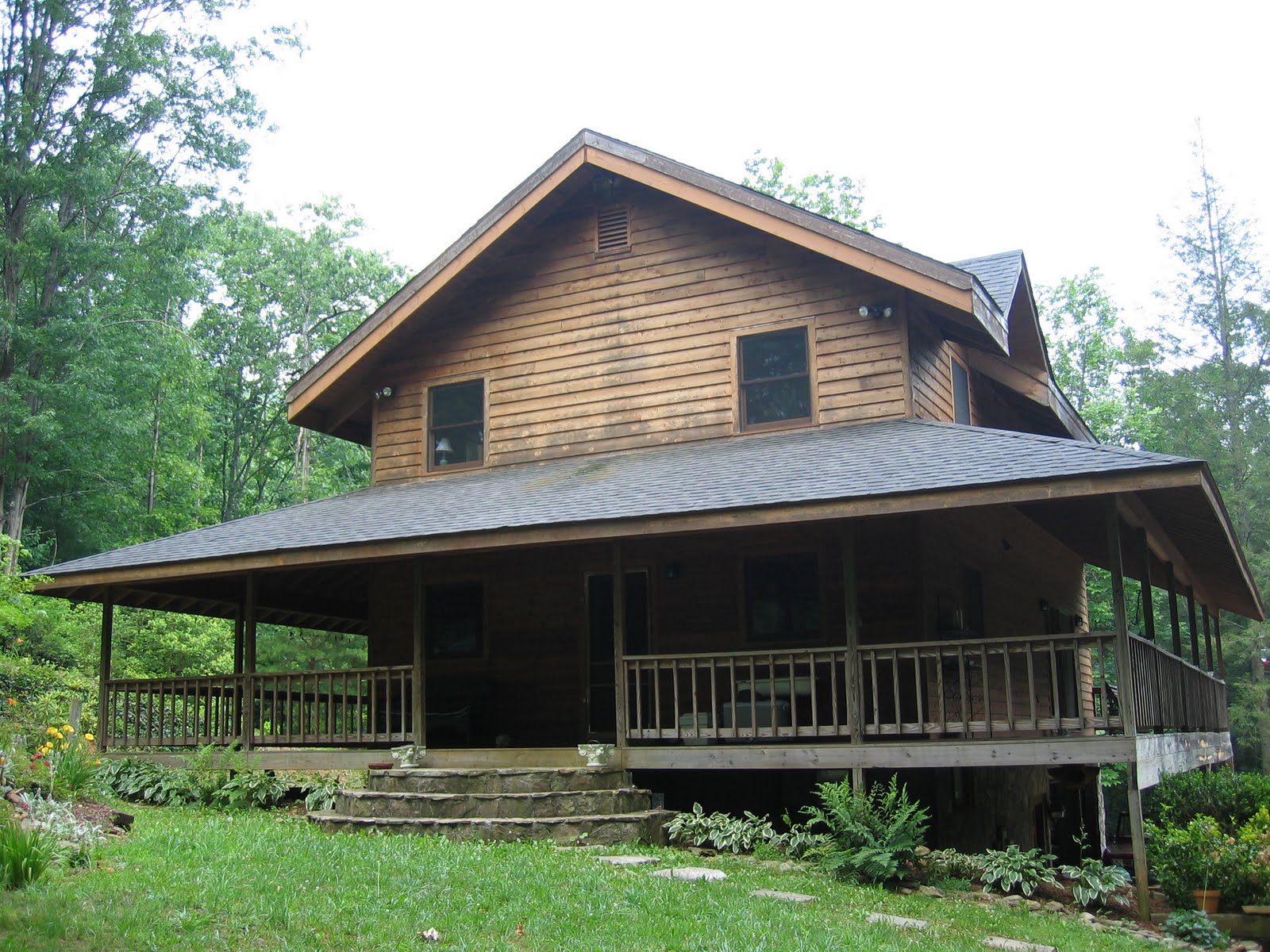 Log Cabin With Wrap Around Porch