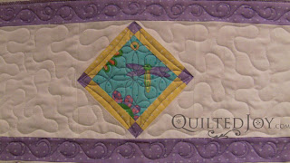 Playful Purple Daisy with custom quilting by Angela Huffman - QuiltedJoy.com