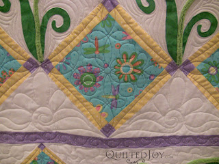 Playful Purple Daisy with custom quilting by Angela Huffman - QuiltedJoy.com