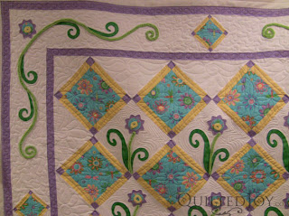Playful Purple Daisy with custom quilting by Angela Huffman - QuiltedJoy.com