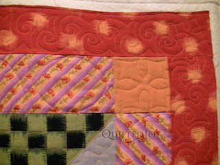 Fassett in the Forest Quilt with custom quilting by Angela Huffman- QuiltedJoy.com