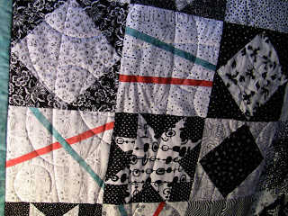 Funky Black and White Modern Quilt, with custom quilting by Angela Huffman - QuiltedJoy.com