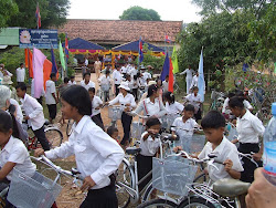 76 Children Ride Away on Rotary Bicycles