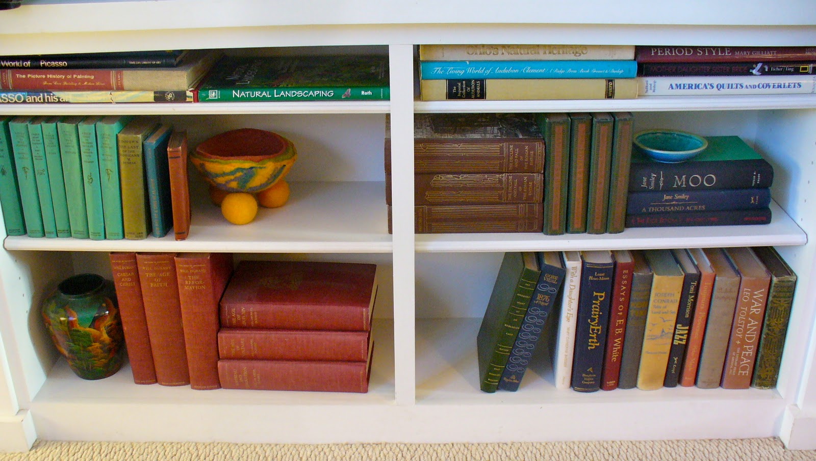penny dish How to Arrange Your Bookshelves