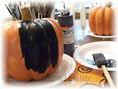 Step 3 Paint pumpkins black