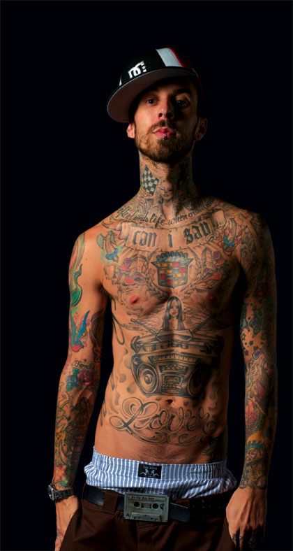 Travis Barker tattoos combination of old school and new school tattoos