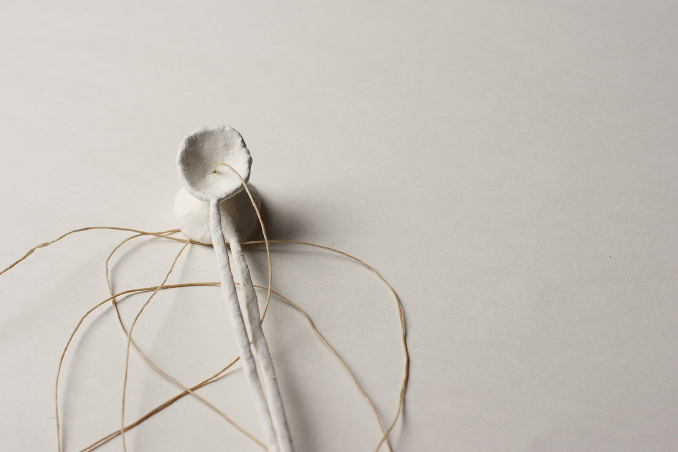 A Love Story, 2008. waxed thread through paper over wire. 22.5 x 3 cm together