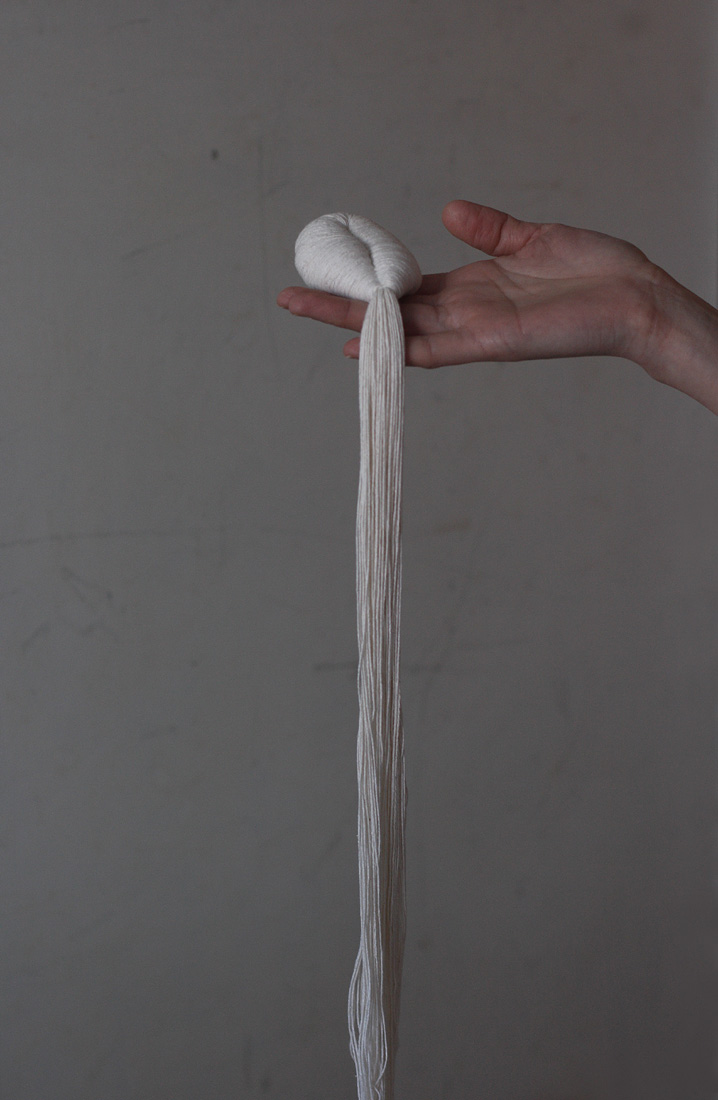 Woman, Weeping, 2009. string, paper & wire. 166 x 5.5 cm