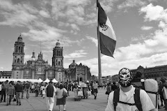Masked Man and Clouds on the Zocalo