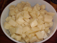 Peel and dice potatoes.