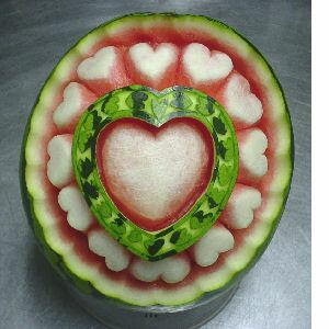 Watermelon carving art - seen at curiousphotos.blogspot.com