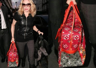 Madonna 2 230409 louis vuitton bag hi-res stock photography and