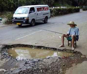 fishing_in_pothole.jpg