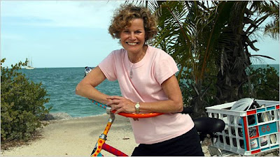 Judy Blume with bicycle at beach
