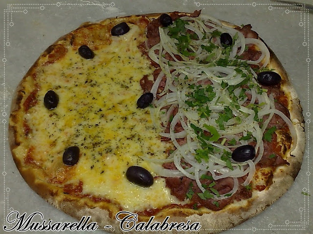 Mussarella Cremosa,Calabresa Fatiada,Cebola e Salsa