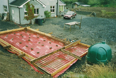 Raft foundation, with 'red carpet' radon barrier and criss-cross re-inforced steel