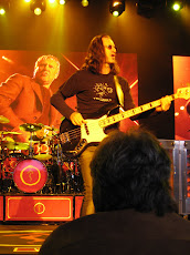 Geddy Lee as photographed by Reg