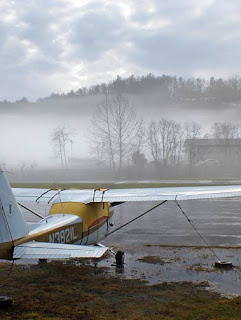 mist and small plane