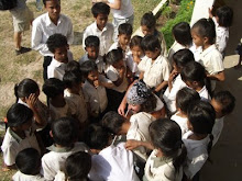CAMBODIA:  Songs gather the children