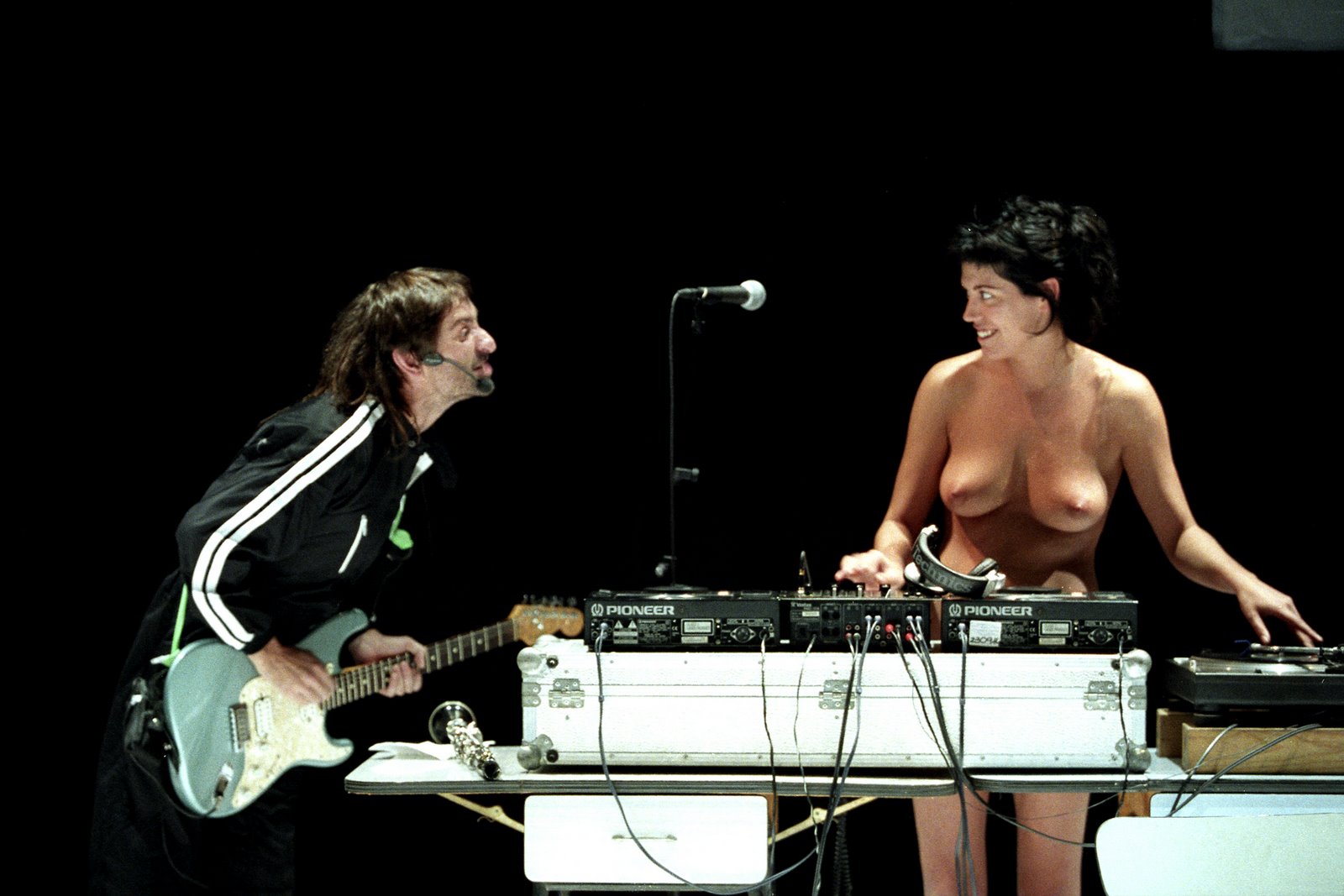 Naked female musicians.