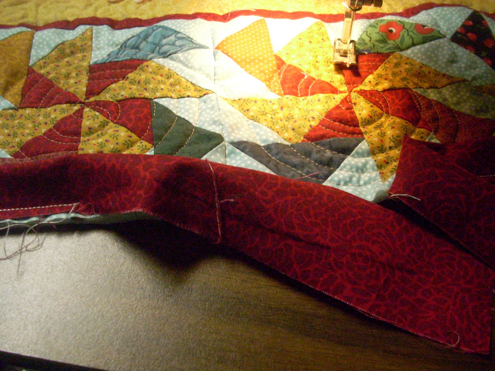 Unsewn ends of binding on a quilt