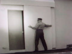 A Civil Defense Guard Closes Up The Bunker Entrance Doors