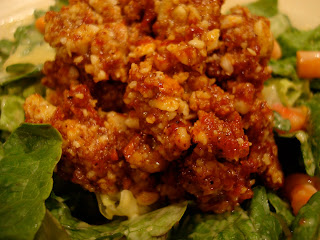 Close up of Raw Vegan Taco Nut "Meat" on salad