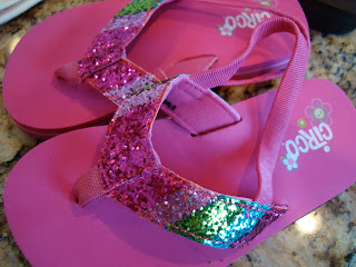 Pink and sparkly flip flops
