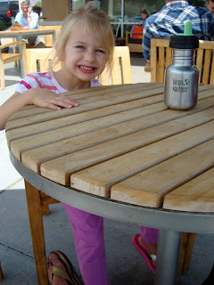 Smiling child sitting at table