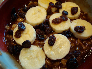 Oatmeal topped with bananas and raisins  - 58