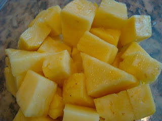 Diced up pineapple in container
