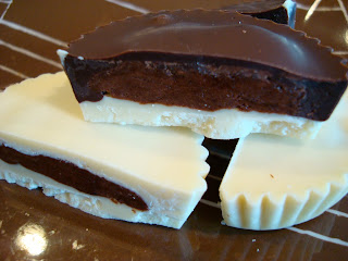 Vegan White and Dark Chocolate Peanut Butter Cups stacked and cut in half