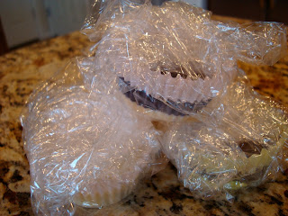 Vegan White Chocolate Chocolate-Peanut Butter Cups wrapped in plastic wrap